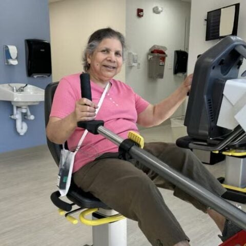 BMC Brighton cardiovascular patient Ruma uses exercise equipment as part of her rehabilitation