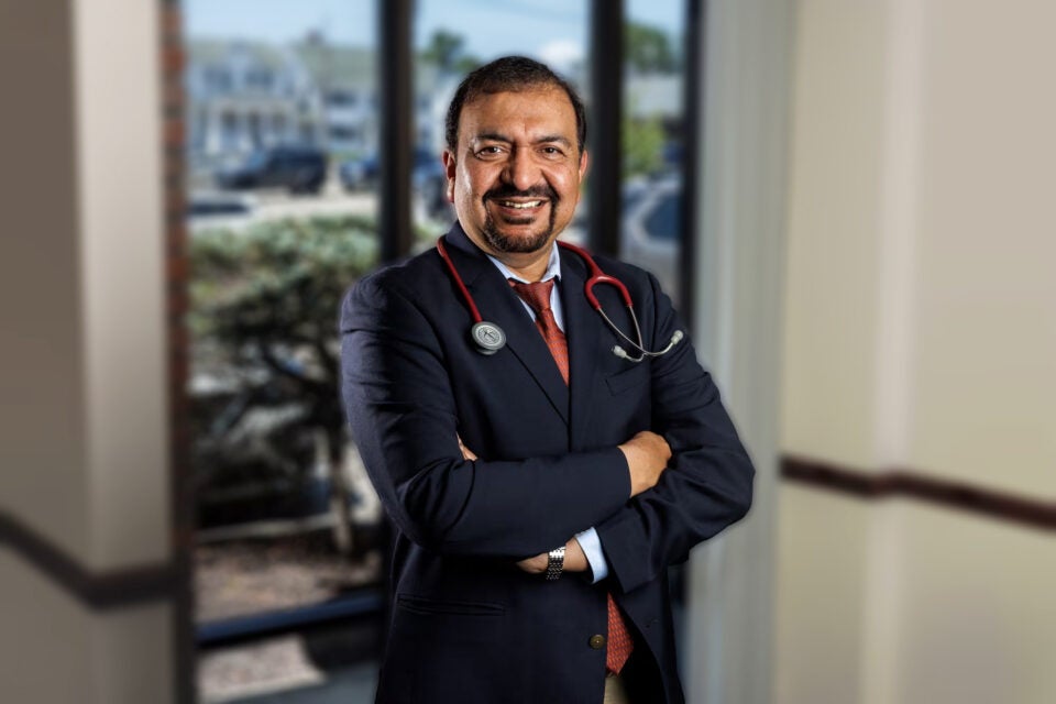 Headshot of Mahmood M. Rana, MD, DipABLM, primary care physician at BMC Health Multispecialty Care Norwood (landscape orientation, blurred background)