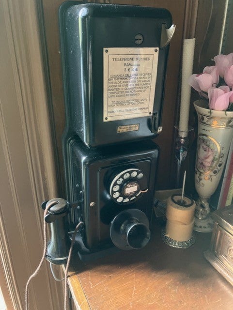 An antique rotary-style phone restored by BMC Health System cardiac surgeon George Tolis, Jr., MD
