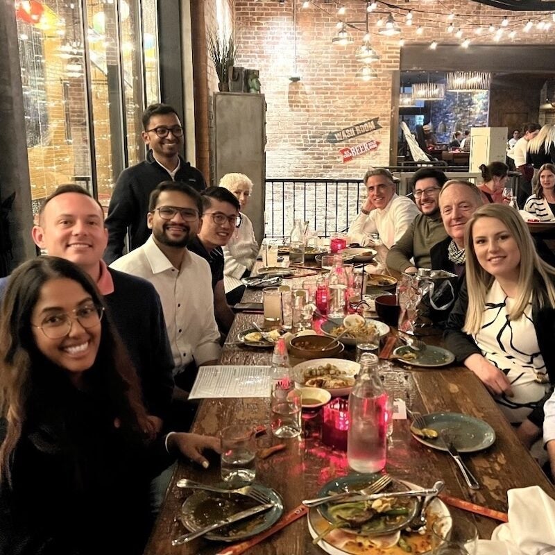 Pulmonary and critical care medicine fellows and faculty at a celebratory dinner